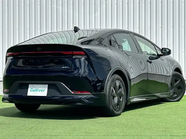 トヨタ プリウス U 香川県 2023(令5)年 2.4万km アティチュードブラックマイカ 純正オーディオ/→AM/FM/Bluetooth/フルセグTV/モデリスタエアロ/バックカメラ/レーダークルーズコントロール/レーンキープアシスト/ビルトイン2.0ETC/オートハイビーム/LEDヘッドライト/シートヒーター/純正フロアマット/ステアリングスイッチ/革巻きステアリング/プッシュスタート/スマートキー/コーナーセンサー/前後ドライブレコーダー