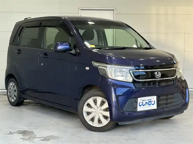 ホンダ Ｎ ＷＧＮ G コンフォートパッケージ 沖縄県 2015(平27)年 6.1万km プレミアムブルームーンパール (株)IDOMが運営する【じしゃロンOO店】の自社ローン専用車両になりますこちらは現金またはオートローンご利用時の価格です。自社ローンご希望の方は別途その旨お申付け下さい/・プッシュスタート　/・ナビ　/・ＴＶ　/・Ｂｌｕｅｔｏｏｔｈ接続　/・バックカメラ　/・サイドエアバック　/・カーテンエアバック　/・純正フロアマット　/・横滑り防止装置　/・シートヒーター　/・取扱説明書　/・スマートキー