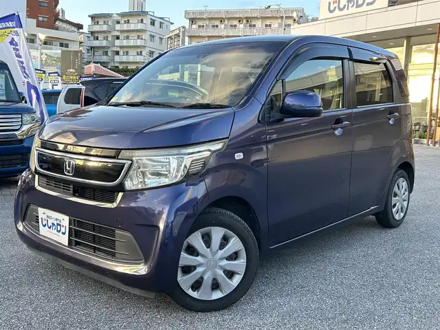 ホンダ Ｎ ＷＧＮ G コンフォートパッケージ 沖縄県 2015(平27)年 6.1万km プレミアムブルームーンパール (株)IDOMが運営する【じしゃロンOO店】の自社ローン専用車両になりますこちらは現金またはオートローンご利用時の価格です。自社ローンご希望の方は別途その旨お申付け下さい/・プッシュスタート　/・ナビ　/・ＴＶ　/・Ｂｌｕｅｔｏｏｔｈ接続　/・バックカメラ　/・サイドエアバック　/・カーテンエアバック　/・純正フロアマット　/・横滑り防止装置　/・シートヒーター　/・取扱説明書　/・スマートキー