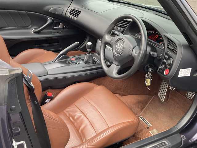 ホンダ Ｓ２０００ 茨城県 2009(平21)年 12.3万km プレミアムサンセットモーブパール H24年-現在までの車検記録簿有/R5年 足回りの分解整備記録簿有(ディーラー)/・エンジンマウント2個/・ミッションマウント2個/・デファレンシャルマウント４個/・前後左右サスペンション一式/・前後左右アーム類一式/CD再生機能付きオーディオ/本革レザーシート/電動フルオープンカー/HIDヘッドライト/純正17inアルミホイール/フロアマット/リモコンキー/取扱説明書/保証書