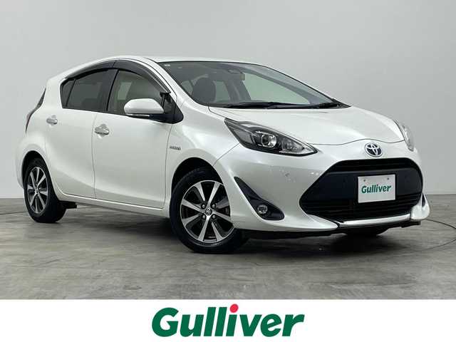 トヨタ アクア 群馬県 2019(令1)年 2.4万km ホワイトパールクリスタルシャイン 衝突軽減　社外７インチナビ　バックカメラ　ＬＥＤライト　オートマチックハイビーム　純正１５インチアルミホイール　クリアランスソナー　ドライブレコーダー　ＥＴＣ　スマートキー　プッシュスタート　禁煙車