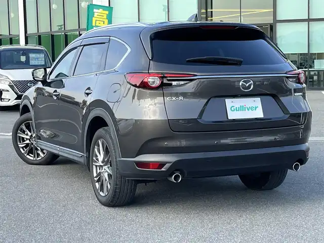 マツダ ＣＸ－８ XD Lパッケージ 奈良県 2022(令4)年 1.2万km チタニウムフラッシュマイカ 純正10.25インチナビ/（フルセグ/BT/CD/DVD）/BOSEプレミアムサウンドシステム/レーダークルーズコントロール/アラウンドビューモニター/ブラインドスポットモニター/前後コーナーセンサー/プリクラッシュセーフティ/レーンキープアシスト/パワーバックドア/レザーシート（レッド）/運転席メモリーシート/前席パワーシート/全席シートヒーター/ステアリングヒーター/ヘッドアップディスプレイ/ワイヤレス充電/後席サンシェード/ETC/前後ドライブレコーダー（ZDR-016）/純正19インチAW/取り扱い説明書/スペアキーX1