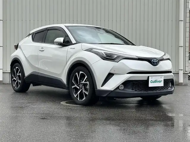 トヨタ Ｃ－ＨＲ G 富山県 2017(平29)年 5.8万km ホワイトパールクリスタルシャイン 純正9型ナビ（フルセグTV・CD/DVD・Bluetooth・ラジオ）/バックカメラ/前席シートヒーター/ハーフレザー/ドライブレコーダー/革巻きステアリング/ステアリングスイッチ/クルーズコントロール/レーンキープアシスト/横滑り防止装置/ビルトインETC/パーキングホールド/クリアランスソナー/EVMOOD/LEDライト/純正18AW/スペアキー１本