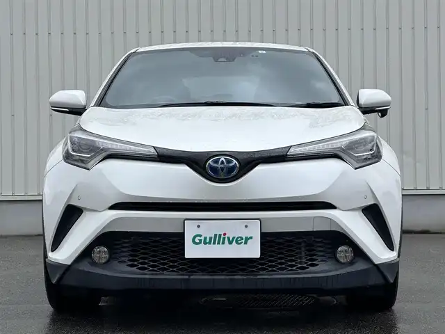 トヨタ Ｃ－ＨＲ G 富山県 2017(平29)年 5.8万km ホワイトパールクリスタルシャイン 純正9型ナビ（フルセグTV・CD/DVD・Bluetooth・ラジオ）/バックカメラ/前席シートヒーター/ハーフレザー/ドライブレコーダー/革巻きステアリング/ステアリングスイッチ/クルーズコントロール/レーンキープアシスト/横滑り防止装置/ビルトインETC/パーキングホールド/クリアランスソナー/EVMOOD/LEDライト/純正18AW/スペアキー１本