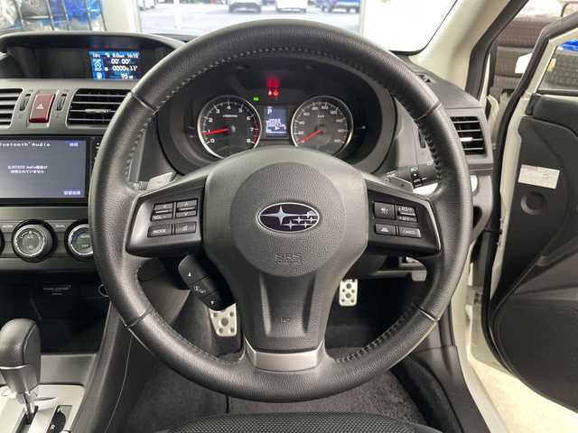 スバル インプレッサ ＸＶ 2．0i－L アイサイト 道央・札幌 2013(平25)年 3.1万km サテンホワイトパール ナビ【TV/BT/FM)/アイサイト/４WD/ドライブレコーダー/社外エアロ/社外マフラー/アイドリンストップ/クルーズコントロール/ハーフレザーシート/D席パワーシート/ETC/純正アルミホイール/HIDヘッドライト/オートライト/パドルシフト/MTモード付きAT/革巻きステアリング/ステアリングスイッチ/電格ミラー/横滑り防止/プッシュスタート/スマートキー