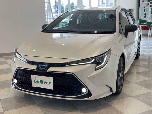 トヨタ カローラツーリング ハイブリッド ダブルバイビー 福井県 2020(令2)年 6.4万km ホワイトパールクリスタルシャイン ワンオーナー/純正7インチディスプレイオーディオ/バックカメラ/トヨタセーフティセンス/・プリクラッシュセーフティ/・レーントレーシングアシスト/・レーダークルーズコントロール/・リヤクロストラフィックアラート/・パーキングサポートブレーキ/・オートマチックハイビーム/・ロードサインアシスト/・先行車発進アラーム/ブラインドスポットモニター/コーナーセンサー/ETC/前後ドライブレコーダー/オプティトロンメーター/オートライト/丸型1灯式LEDヘッドランプ/LEDデイライト/ハーフレザーシート/純正17インチアルミホイール/プッシュスタート/スマートキー×2/純正フロアマット