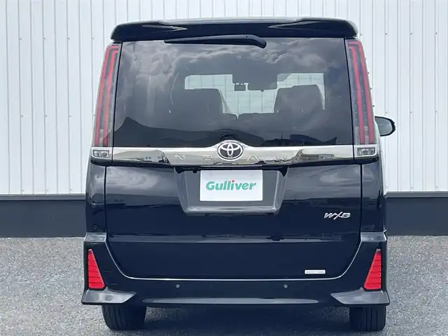 トヨタ ノア Si ダブルバイビーⅢ 千葉県 2021(令3)年 3.6万km ブラック 純正10インチナビ/(Bluetooth/フルセグTV/CD/DVD)/バックカメラ/衝突被害軽減システム/車線逸脱警報/クルーズコントロール/フリップダウンモニター/ハーフレザーシート/両側パワースライドドア/横滑り防止装置/ETC/ドライブレコーダー/アイドリングストップ/LEDヘッドライト/フォグランプ/オートライト/ウィンカーミラー/電動格納ミラー/純正16インチAW/シートリフター/プッシュスタート/スマートキー/ドアバイザー/取扱説明書