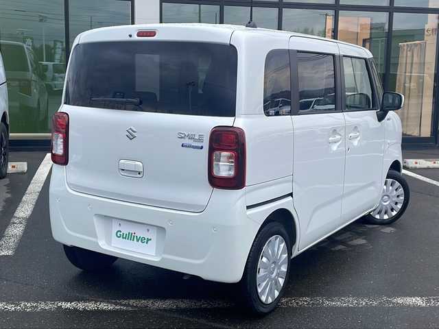 スズキ ワゴンＲ スマイル HYBRID S 道東・釧路十勝 2021(令3)年 3.5万km ピュアホワイトP ・４WD/・社外SDメモリナビ/（CD・ラジオ・BT・ワンセグ）/・バックカメラ/・両側パワースライドドア/・スマートキー/・プッシュスタート/・スズキセーフティサポート/・衝突被害軽減ブレーキ/・踏み間違い防止/・車線逸脱防止機能/・先行車発進お知らせ/・オートハイビーム/・オートライト/・電動格納ミラ/・純正フロアマット/・前席シートヒーター/・アイドリングストップ/・ヘッドライトレベライザー/・社外ETC/・保証書/・取扱説明書