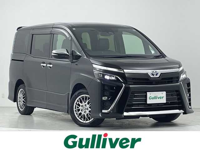 トヨタ ヴォクシー ハイブリッド ZS 煌Ⅲ 大阪府 2021(令3)年 2.9万km イナズマスパーキングブラックガラスフレーク トヨタセーフティセンス/・衝突軽減ブレーキ/純正１０型ナビ/（CD/DVD/Bluetooth/フルセグTV）/バックカメラ/両側パワースライドドア/ハーフレザーシート/前席シートヒーター/ＥＴＣ２．０/ＬＥＤヘッドライト/フォグランプ/コーナーセンサー/クルーズコントロール