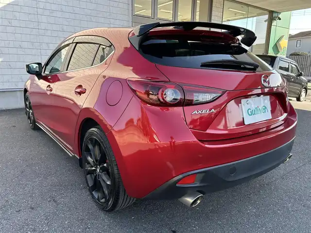 マツダ アクセラ スポーツ 20S ツーリング 埼玉県 2015(平27)年 1.7万km ソウルレッドプレミアムメタリック ワンオーナー/純正ナビオーディオ/(AM/FM/BT/AUX/USB)/バックカメラ/ETC/純正ETCボックス/RVM/LDWS/AFS/HBC/SCBS/バーグラアラームシステム/ヘッドアップディスプレイ/クルーズコントロール（追従無し）/前後ドライブレコーダー　/アイドリングストップ/オートライト/オートエアコン/プッシュスタートボタン/スマートキー×１/ステアリングスイッチ/USB入力端子/純正フロアマット/Auto exeフルスポイラー/Auto exe リアウィング/純正アルミ黒塗装/EXART マフラー/車両/ナビ 取扱説明書/保証書