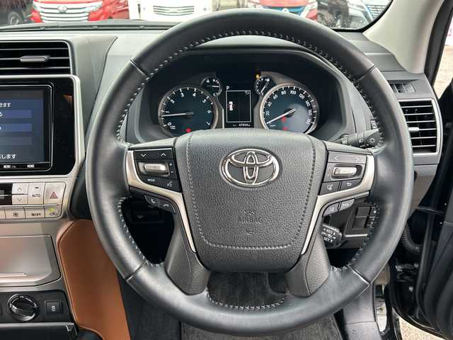 トヨタ ランドクルーザー プラド TX-L 70thアニバーサリーLTD 富山県 2022(令4)年 4.8万km ブラック 純正９型ナビ/フルセグＴＶ／Ｂｌｕｅｔｏｏｔｈ/バックカメラ/レーダークルーズコントロール/レーンキープアシスト/プリクラッシュセーフティ/純正AW１８インチ/茶革シート/シートヒーター／シートクーラー/運転席／助手席パワーシート/ヘッドライトウォッシャー/LEDヘッドライト/スマートキー/プッシュスタート/横滑り防止装置/Wエアバック/サイド＋カーテンエアバック