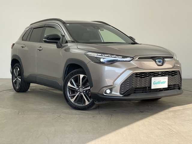 トヨタ カローラ クロス ハイブリッド Z 兵庫県 2021(令3)年 5.8万km アバンギャルドブロンズメタリック ・純正10.5インチディスプレイオーディオ/・Bluetooth/Apple car play/Android Auto/Miracast/・全方位カメラ/・Toyota Safety Sense/・プリクラッシュセーフティ/・レーントレーシングアシスト/・レーダークルーズコントロール（全車速追従機能付）/・オートマチックハイビーム/・ロードサインアシスト/・パーキングサポートブレーキ（前後方静止物）/・ブラインドスポットモニター/・パーキングサポートブレーキ（後方接近車両）/・車両接近通報装置/・先行車発進告知機能/・パワーバックドア/・ステアリングヒーター/・ハーフレザーシート/・前席シートヒーター/・運転席パワーシート/・寒冷地仕様/・前後ドライブレコーダー/・ルーフレール/・LEDヘッドライト/・フォグランプ/・純正アルミホイールタイヤ/・スマートキー/・スペアキー