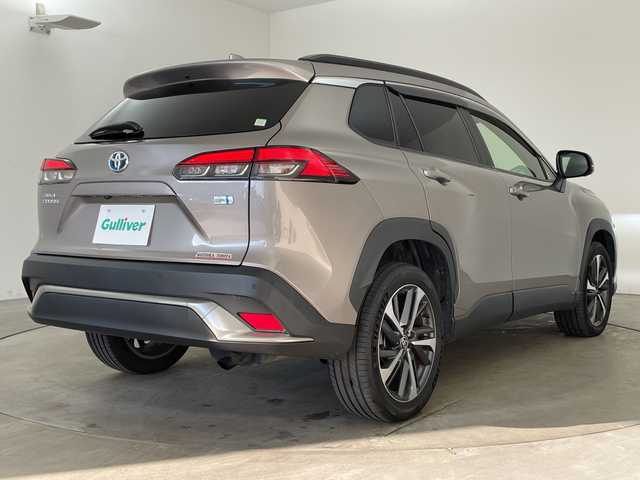 トヨタ カローラ クロス ハイブリッド Z 兵庫県 2021(令3)年 5.8万km アバンギャルドブロンズメタリック ・純正10.5インチディスプレイオーディオ/・Bluetooth/Apple car play/Android Auto/Miracast/・全方位カメラ/・Toyota Safety Sense/・プリクラッシュセーフティ/・レーントレーシングアシスト/・レーダークルーズコントロール（全車速追従機能付）/・オートマチックハイビーム/・ロードサインアシスト/・パーキングサポートブレーキ（前後方静止物）/・ブラインドスポットモニター/・パーキングサポートブレーキ（後方接近車両）/・車両接近通報装置/・先行車発進告知機能/・パワーバックドア/・ステアリングヒーター/・ハーフレザーシート/・前席シートヒーター/・運転席パワーシート/・寒冷地仕様/・前後ドライブレコーダー/・ルーフレール/・LEDヘッドライト/・フォグランプ/・純正アルミホイールタイヤ/・スマートキー/・スペアキー