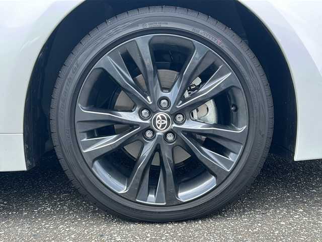トヨタ カローラ ハイブリット ダブルバイビー 富山県 2023(令5)年 0.4万km プラチナホワイトパールマイカ ワンオーナー/スマートキー（２本）/ハーフレザーシート/4WD/メーカーオプションナビ/衝突安全ブレーキ/フルセグTV/Bluetooth/ビルトインETC2.0/純正17インチAW/ACC/レーンキープアシスト/シートヒーター（D/N）/LEDヘッドライト/フォグランプ/純正フロアマット/純正ドアバイザー/横滑り防止装置/電動パーキングブレーキ/電動格納ウィンカーミラー/ハンドルヒーター/ブラインドスポットモニター/モデリスタスカッフプレート