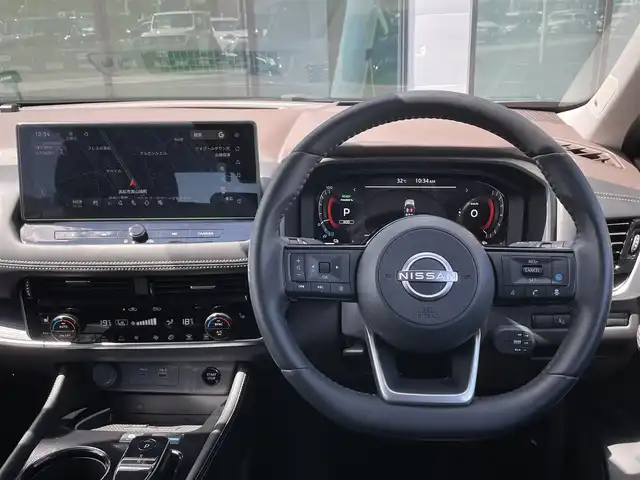 日産 エクストレイル G e－4ORCE 香川県 2023(令5)年 1.8万km ダイヤモンドブラック プロパイロット/純正12.3インチナビ/BOSE/アラウンドビュー/バックカメラ/レザーシート/パワーシート/シートヒーター/革巻きステアリング/ステアリングヒーター/ステアリングリモコン/パーキングアシスト/LEDライト/パワーバックドア/ワイヤレス充電/AC充電/電動パーキング/スマートキー/プッシュスタート
