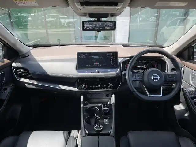 日産 エクストレイル G e－4ORCE 香川県 2023(令5)年 1.8万km ダイヤモンドブラック プロパイロット/純正12.3インチナビ/BOSE/アラウンドビュー/バックカメラ/レザーシート/パワーシート/シートヒーター/革巻きステアリング/ステアリングヒーター/ステアリングリモコン/パーキングアシスト/LEDライト/パワーバックドア/ワイヤレス充電/AC充電/電動パーキング/スマートキー/プッシュスタート