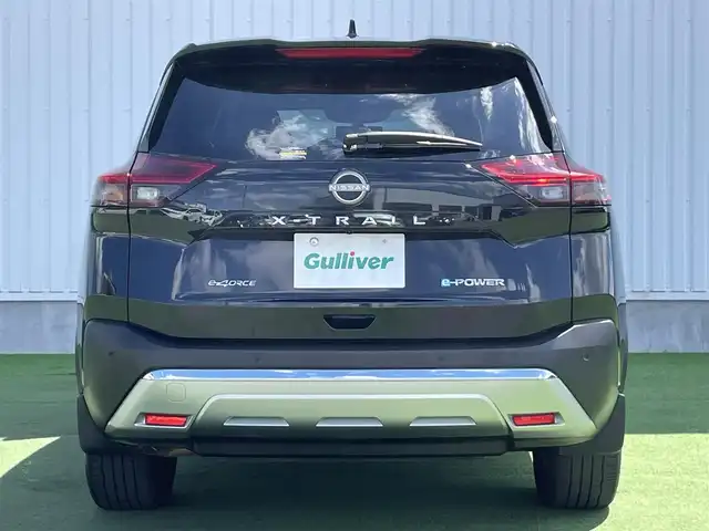 日産 エクストレイル G e－4ORCE 香川県 2023(令5)年 1.8万km ダイヤモンドブラック プロパイロット/純正12.3インチナビ/BOSE/アラウンドビュー/バックカメラ/レザーシート/パワーシート/シートヒーター/革巻きステアリング/ステアリングヒーター/ステアリングリモコン/パーキングアシスト/LEDライト/パワーバックドア/ワイヤレス充電/AC充電/電動パーキング/スマートキー/プッシュスタート