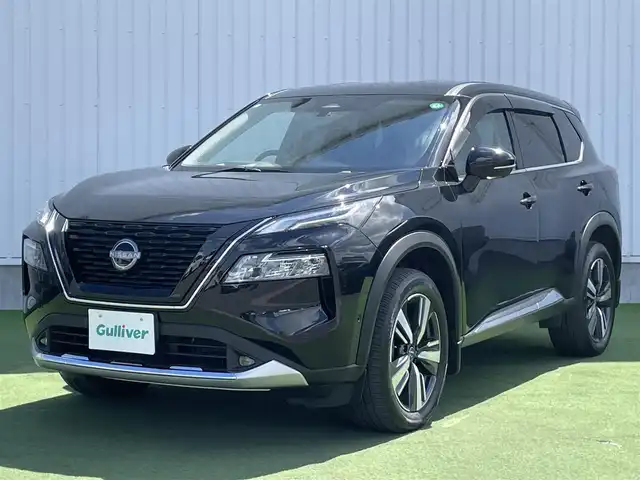 日産 エクストレイル G e－4ORCE 香川県 2023(令5)年 1.8万km ダイヤモンドブラック プロパイロット/純正12.3インチナビ/BOSE/アラウンドビュー/バックカメラ/レザーシート/パワーシート/シートヒーター/革巻きステアリング/ステアリングヒーター/ステアリングリモコン/パーキングアシスト/LEDライト/パワーバックドア/ワイヤレス充電/AC充電/電動パーキング/スマートキー/プッシュスタート