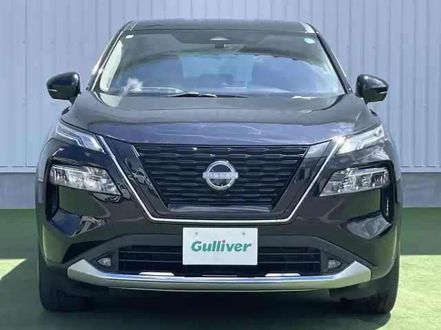 日産 エクストレイル G e－4ORCE 香川県 2023(令5)年 1.8万km ダイヤモンドブラック プロパイロット/純正12.3インチナビ/BOSE/アラウンドビュー/バックカメラ/レザーシート/パワーシート/シートヒーター/革巻きステアリング/ステアリングヒーター/ステアリングリモコン/パーキングアシスト/LEDライト/パワーバックドア/ワイヤレス充電/AC充電/電動パーキング/スマートキー/プッシュスタート