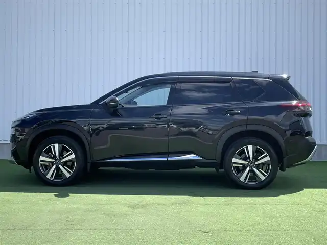 日産 エクストレイル G e－4ORCE 香川県 2023(令5)年 1.8万km ダイヤモンドブラック プロパイロット/純正12.3インチナビ/BOSE/アラウンドビュー/バックカメラ/レザーシート/パワーシート/シートヒーター/革巻きステアリング/ステアリングヒーター/ステアリングリモコン/パーキングアシスト/LEDライト/パワーバックドア/ワイヤレス充電/AC充電/電動パーキング/スマートキー/プッシュスタート
