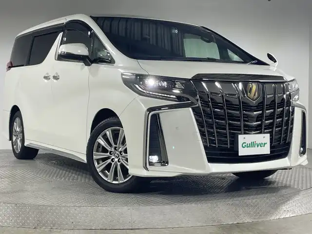 トヨタ アルファード S タイプゴールド 神奈川県 2021(令3)年 3.3万km ホワイトパールクリスタルシャイン 純正10型SDナビゲーション/AM FM フルセグ Bluetooth USB Miracast/バックカメラ/両側パワースライドドア/純正フリップダウンモニター/セーフティセンス/プリクラッシュセーフティ/レーントレーシングアラート/ロードサインアシスト/レーダークルーズコントロール/パーキングサポートブレーキ/クリアランスソナー/前後ドライブレコーダー/オートホールド/ステアリングリモコン/ハーフレザーシート/ビルトインETC/プッシュスタート/スマートキー/LEDヘッドライト/オートライト/オートマチックハイビーム/純正18インチアルミホイル