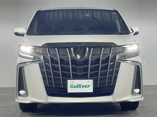 トヨタ アルファード S タイプゴールド 神奈川県 2021(令3)年 3.3万km ホワイトパールクリスタルシャイン 純正10型SDナビゲーション/AM FM フルセグ Bluetooth USB Miracast/バックカメラ/両側パワースライドドア/純正フリップダウンモニター/セーフティセンス/プリクラッシュセーフティ/レーントレーシングアラート/ロードサインアシスト/レーダークルーズコントロール/パーキングサポートブレーキ/クリアランスソナー/前後ドライブレコーダー/オートホールド/ステアリングリモコン/ハーフレザーシート/ビルトインETC/プッシュスタート/スマートキー/LEDヘッドライト/オートライト/オートマチックハイビーム/純正18インチアルミホイル