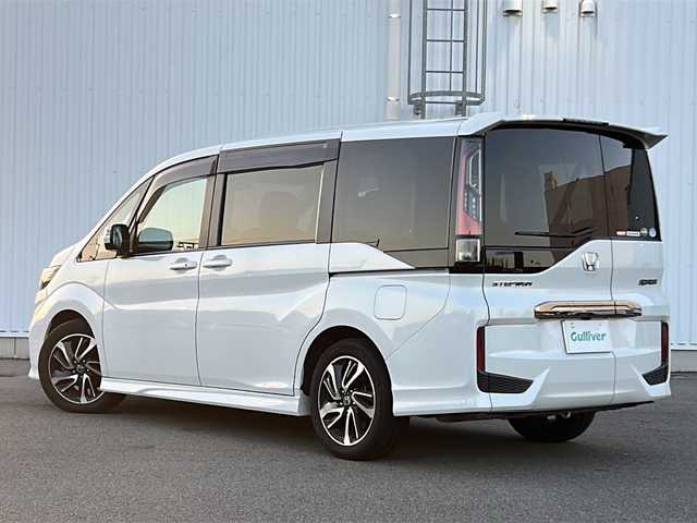 ホンダ ステップワゴン 愛媛県 2019(令1)年 8.8万km プラチナホワイトパール ホンダセンシング/フリップダウンモニター/SDナビ/BT/CD/DVD/フルセグTV/ハーフレザーシート/衝突被害軽減システム/両側パワースライドドア/バックカメラ/追従クルコン/パドルシフト/純正フロアマット/純正アルミホイール/スマートキー/WAC/LEDヘッドライト/オートライト