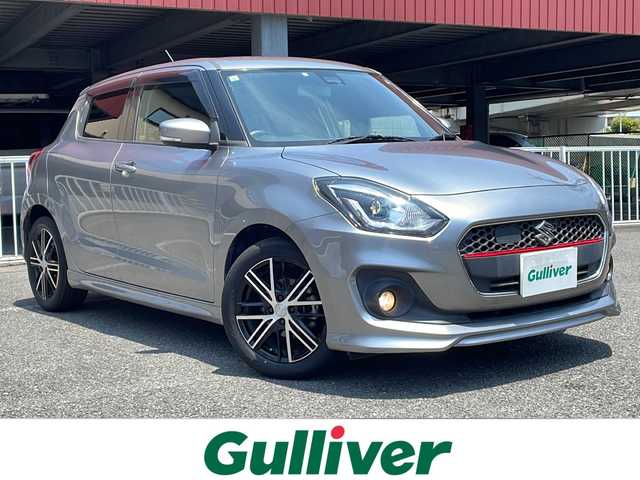 スズキ スイフト HYBRID RS 神奈川県 2017(平29)年 5.7万km プレミアムシルバーメタリック セーフティパッケージ装着車/純正メモリーナビ【KXM-E502W】			/・DTV/SD/CD/DVD/BT/バックカメラ/D席シートヒーター/アイドリングストップ/ETC/デュアルブレーキサポート/車線逸脱警報/アダプティブクルーズコントロール/社外16インチAW/純正LEDヘッドライト/フォグランプ/プッシュEgスタート/ストップ/スマートキー×2/ターンランプ付電動格納ドアミラー/ドアバイザー/純正フロアマット/取扱説明書/ナビ取扱説明書/新車時保証書