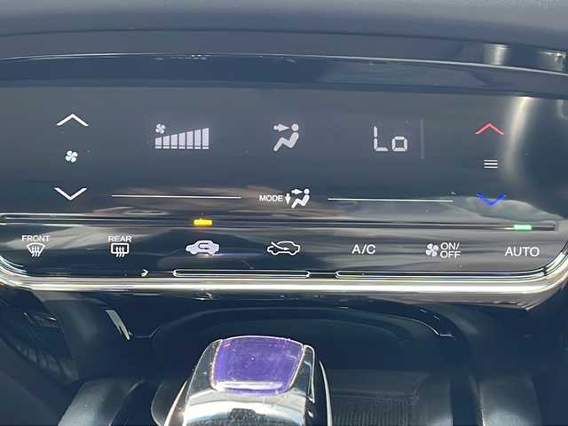 ホンダ ヴェゼル ハイブリッド X 三重県 2014(平26)年 4.9万km ホワイトオーキッドパール 純正ナビ/バックカメラ/パドルシフト/スペアキー/オートライト/革巻きステアリング/クルーズコントロール/電子パーキング/ビルトインETC/横滑り防止/電動格納ミラー/禁煙車