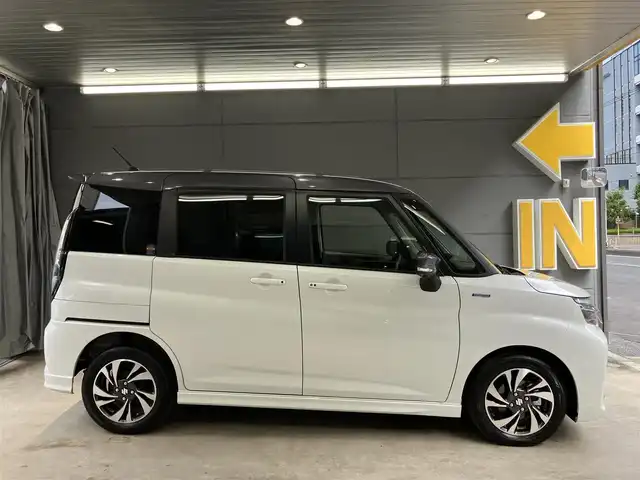 スズキ ソリオ バンディット HV MV 東京都 2025(令7)年 0.4万km ピュアホワイトパール/ガンメタリック2トーン 4WD/ワンオーナー/2トーンルーフ仕様/セーフティサポート/・デュアルセンサーサポート2/・誤発進抑制機能/・後方誤発進抑制機能/・パーキングセンサー/・低速時ブレーキサポート（前進・後退）/・車線逸脱抑制機能/・車線逸脱警告機能/・ふらつき警告機能/・標識認識機能/・ハイビームアシスト/・ブラインドスポットモニター/・アクティブクルーズコントロール/両側パワースライドドア/純正9インチナビ/・地デジ/DVD/CD/USBソケット/全方位カメラ/AppleCarPlay Android auto/プッシュスタート/ヘッドアップディスプレイ/シートヒーター /保証書・取扱説明書・スペアキー