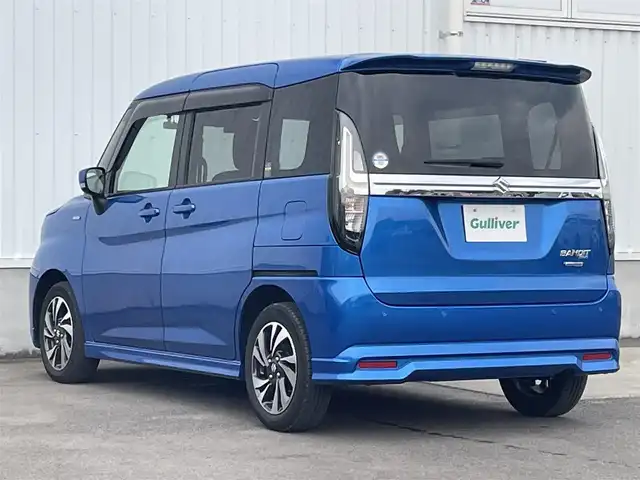 スズキ ソリオ バンディット HV MV 愛媛県 2022(令4)年 3万km スピーディーブルーM 左側パワースライドドア/社外ナビ(CD/DVD)/後席モニター/ミラー型前後ドライブレコーダー/レーダークルーズコントロール/アイドリングストップ/レーンキープアシスト/コーナーセンサー/LEDヘッドライト/オートライト/フォグランプ/純正フロアマット/純正ドアバイザー/純正アルミホイール/デュアルカメラブレーキサポート/横滑り防止装置/スマートキー/プッシュスタート/ABS