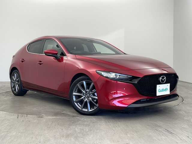マツダ マツダ３ファストバック 15S ツーリング 兵庫県 2020(令2)年 1.2万km ソウルレッドクリスタルM 純正ナビ/TV/BT/USB/DVD/CD/SD/バックカメラ/レーダークルーズコントロール/ドライバーアテンションアラート/後側方接近車両検知/車線逸脱警報システム/ブラインドスポットモニター/レーンキープアシスト/ディスタンス＆スピードアラート/スマートブレーキアシスト/パーキングセンサー/ビルトインETC/LEDヘッドライト/純正アルミホイール/純正フロアマット/横滑り防止/電動パーキングブレーキ/ブレーキホールド/防眩ミラー/アイドリングストップ/スマートキー