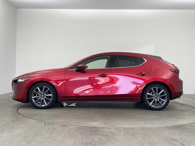 マツダ マツダ３ファストバック 15S ツーリング 兵庫県 2020(令2)年 1.2万km ソウルレッドクリスタルM 純正ナビ/TV/BT/USB/DVD/CD/SD/バックカメラ/レーダークルーズコントロール/ドライバーアテンションアラート/後側方接近車両検知/車線逸脱警報システム/ブラインドスポットモニター/レーンキープアシスト/ディスタンス＆スピードアラート/スマートブレーキアシスト/パーキングセンサー/ビルトインETC/LEDヘッドライト/純正アルミホイール/純正フロアマット/横滑り防止/電動パーキングブレーキ/ブレーキホールド/防眩ミラー/アイドリングストップ/スマートキー