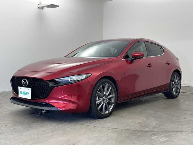 マツダ マツダ３ファストバック 15S ツーリング 兵庫県 2020(令2)年 1.2万km ソウルレッドクリスタルM 純正ナビ/TV/BT/USB/DVD/CD/SD/バックカメラ/レーダークルーズコントロール/ドライバーアテンションアラート/後側方接近車両検知/車線逸脱警報システム/ブラインドスポットモニター/レーンキープアシスト/ディスタンス＆スピードアラート/スマートブレーキアシスト/パーキングセンサー/ビルトインETC/LEDヘッドライト/純正アルミホイール/純正フロアマット/横滑り防止/電動パーキングブレーキ/ブレーキホールド/防眩ミラー/アイドリングストップ/スマートキー