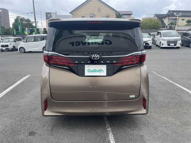 トヨタ アルファード Z 神奈川県 2025(令7)年 0.6万km ゴールド トヨタチームメイト/左右独立ムーンルーフ/ヘッドアップディスプレイ/プレシャスレオブロンド（車体カラー）/自動防眩インナーミラー/ヘッドアップディスプレイ/純13.2型フリップダウンモニター/純正14インチナビ/・Bluetooth/・フルセグTV/トヨタセーフティセンス/・プリクラッシュセーフティ/・レーダークルーズコントロール/・レーンディパーチャーアラート/・オートマチックハイビーム/・レーントレーシングアシスト/LEDヘッドライト/全方位カメラ/1列目、2列目シートヒーター/1列目、2列目シートベンチレーション/1列目、2列目パワーシート/両側パワースライドドア/電動リアゲート/ワイヤレス充電/デジタルミラー/ビルトインETC2.0/ABS/スマートキー×２/新車時手帳/取扱説明書