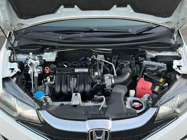 ホンダ フィット ハイブリット Fパッケージ 秋田県 2015(平27)年 8.1万km プレミアムホワイトパールⅡ ・ＥＴＣ/・純正ナビ/・Ｂｌｕｅｔｏｏｔｈ/・オートエアコン/・衝突軽減ブレーキ/・クルーズコントロール/・スマートキー/・スペアキー/・純正フロアマット