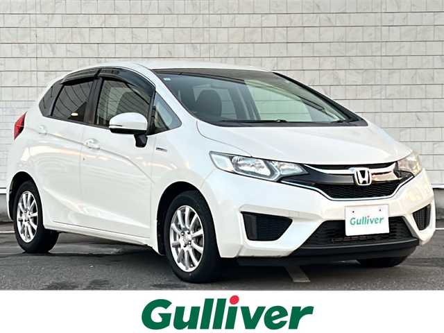 ホンダ フィット ハイブリット Fパッケージ 秋田県 2015(平27)年 8.1万km プレミアムホワイトパールⅡ ・ＥＴＣ/・純正ナビ/・Ｂｌｕｅｔｏｏｔｈ/・オートエアコン/・衝突軽減ブレーキ/・クルーズコントロール/・スマートキー/・スペアキー/・純正フロアマット