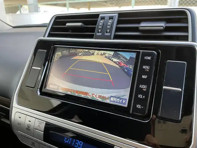 トヨタ ランドクルーザー プラド TX Lパッケージ 和歌山県 2021(令3)年 5.7万km ホワイトパールクリスタルシャイン ワンオーナー/モデリスタエアロ/サンルーフ/ディーラー純正ナビ/（AM/FM/フルセグTV/CD/DVD/SD/SDREC/Bluetooth）/D・N席パワーシート/シートヒーター/ベンチレーション/オートハイビーム/クルーズコントロール/LDA/クリアランスソナー/PCS/RSA/プッシュスタート/ETC/ドライブレコーダー/保証書/取扱説明書/スペアキー×１