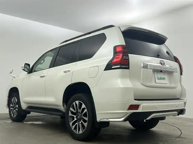 トヨタ ランドクルーザー プラド TX Lパッケージ 岡山県 2023(令5)年 2万km ホワイトパールクリスタルシャイン サンルーフ/モデリスタエアロ（前/後下）/ベージュレザーシート/ルーフレール/純正19インチAW/純正9インチSDナビ/（Bluetooth/フルセグTV)/プリクラッシュセーフティ/レーダークルーズコントロール/踏み間違い防止/オートハイビーム/ＬＥＤヘッドライト（Auto付）/LEDフォグランプ/ビルトインＥＴＣ/バックカメラ/シートヒーター（D/N）/エアシート（D/N）/パワーシート（D/N）/コンビハンドル/ISOFIX/ステアリングスイッチ/チルトステアリング/シートリフター/ウインカーミラー