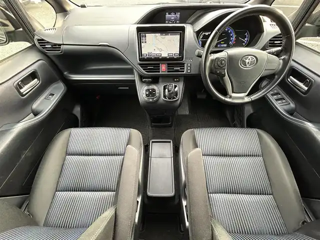 トヨタ ノア ハイブリッド Si 東京都 2016(平28)年 4.4万km ボルドーマイカメタリック ワンオーナー/純正9インチナビ/フルセグTV／Bluetoothオーディオ／DVD再生/バックカメラ/12.1型フリップダウンモニター(V12T-R66C)/両側パワースライドドア/純正ETC2.0/LEDヘッドランプ/トヨタセーフティセンス/スマートキー×2