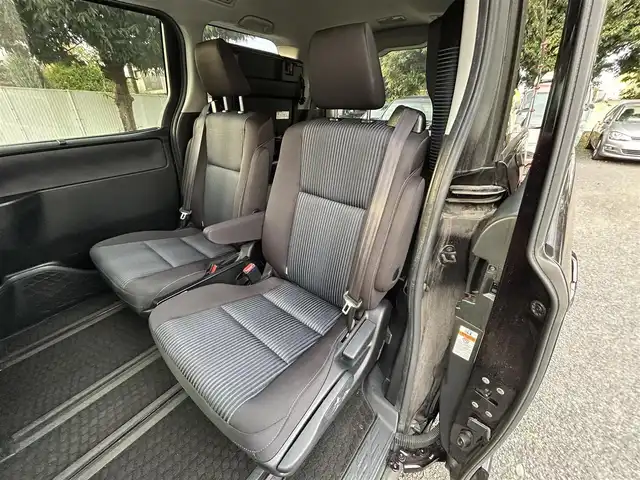 トヨタ ノア ハイブリッド Si 東京都 2016(平28)年 4.4万km ボルドーマイカメタリック ワンオーナー/純正9インチナビ/フルセグTV／Bluetoothオーディオ／DVD再生/バックカメラ/12.1型フリップダウンモニター(V12T-R66C)/両側パワースライドドア/純正ETC2.0/LEDヘッドランプ/トヨタセーフティセンス/スマートキー×2