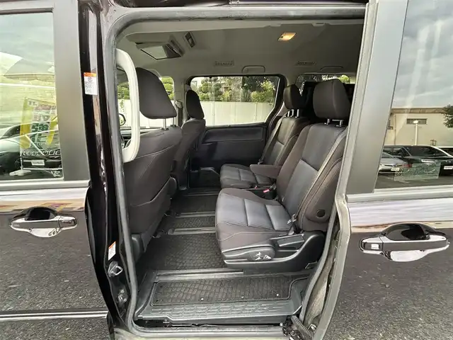 トヨタ ノア ハイブリッド Si 東京都 2016(平28)年 4.4万km ボルドーマイカメタリック ワンオーナー/純正9インチナビ/フルセグTV／Bluetoothオーディオ／DVD再生/バックカメラ/12.1型フリップダウンモニター(V12T-R66C)/両側パワースライドドア/純正ETC2.0/LEDヘッドランプ/トヨタセーフティセンス/スマートキー×2