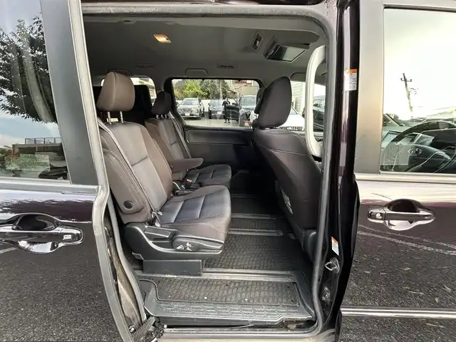 トヨタ ノア ハイブリッド Si 東京都 2016(平28)年 4.4万km ボルドーマイカメタリック ワンオーナー/純正9インチナビ/フルセグTV／Bluetoothオーディオ／DVD再生/バックカメラ/12.1型フリップダウンモニター(V12T-R66C)/両側パワースライドドア/純正ETC2.0/LEDヘッドランプ/トヨタセーフティセンス/スマートキー×2