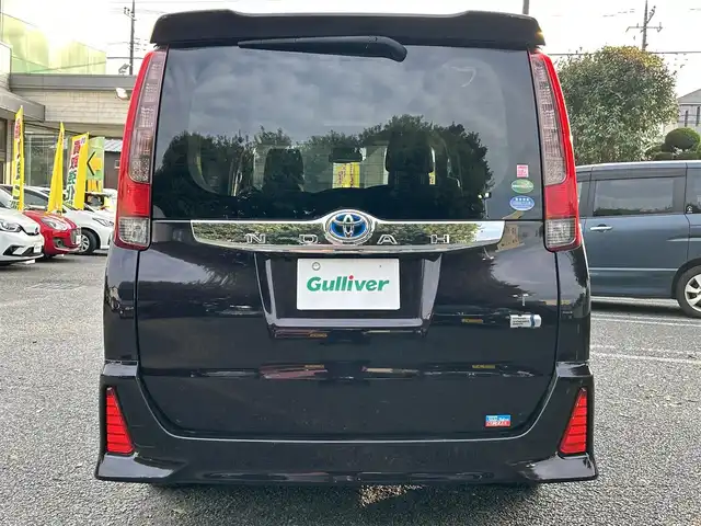 トヨタ ノア ハイブリッド Si 東京都 2016(平28)年 4.4万km ボルドーマイカメタリック ワンオーナー/純正9インチナビ/フルセグTV／Bluetoothオーディオ／DVD再生/バックカメラ/12.1型フリップダウンモニター(V12T-R66C)/両側パワースライドドア/純正ETC2.0/LEDヘッドランプ/トヨタセーフティセンス/スマートキー×2