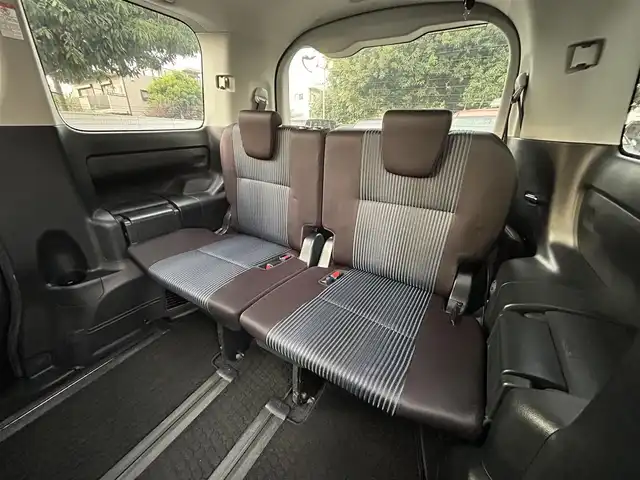 トヨタ ノア ハイブリッド Si 東京都 2016(平28)年 4.4万km ボルドーマイカメタリック ワンオーナー/純正9インチナビ/フルセグTV／Bluetoothオーディオ／DVD再生/バックカメラ/12.1型フリップダウンモニター(V12T-R66C)/両側パワースライドドア/純正ETC2.0/LEDヘッドランプ/トヨタセーフティセンス/スマートキー×2