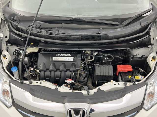 ホンダ フリード ハイブリット ジャストセレクション 宮城県 2015(平27)年 8.8万km ホワイトオーキッドパール 禁煙車/両側パワースライドドア/社外7インチナビ/（BT.CD.DVD.AUX.USB.SD）/バックカメラ/フルセグテレビ/ビルトインETC/革巻きステアリング/ステアリングスイッチ/プッシュスタート/スマートキー/スペアキー/ハーフレザーシート/純正フロアマット/純正15インチアルミホイール/社外15インチアルミホイール付冬タイヤ積込/横滑り防止機能/オートライト/パワーステアリング/パワーウインドウ