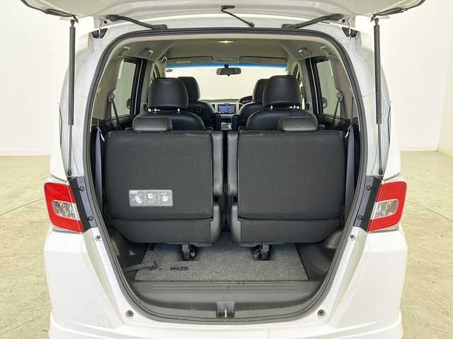 ホンダ フリード ハイブリット ジャストセレクション 宮城県 2015(平27)年 8.8万km ホワイトオーキッドパール 禁煙車/両側パワースライドドア/社外7インチナビ/（BT.CD.DVD.AUX.USB.SD）/バックカメラ/フルセグテレビ/ビルトインETC/革巻きステアリング/ステアリングスイッチ/プッシュスタート/スマートキー/スペアキー/ハーフレザーシート/純正フロアマット/純正15インチアルミホイール/社外15インチアルミホイール付冬タイヤ積込/横滑り防止機能/オートライト/パワーステアリング/パワーウインドウ