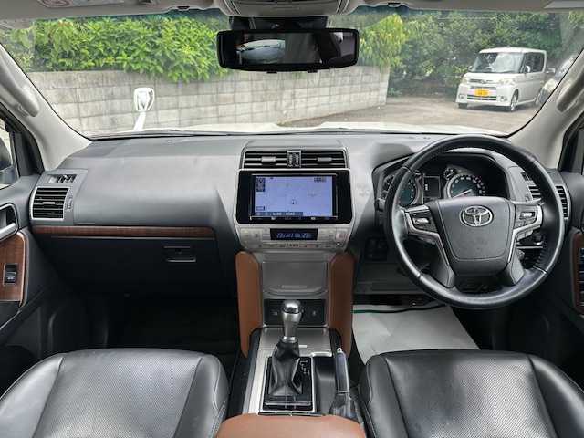 トヨタ ランドクルーザー プラド TX Lパッケージ 大阪府 2020(令2)年 3.8万km ホワイトパールクリスタルシャイン モデリスタエアロ　F/R/純正9型ナビ(NSZT-Y68T)/バック/フロントモニター/フルセグ/Bluetooth/トヨタセーフティセンス/ルーフレール/GANADORマフラー/バックミラーモニター/ブラックレザーシート/パワーシート/シートヒーター/シートベンチレーション/LEDヘッドライト/純正アルミホイール/ビルトインETC/スマートキー