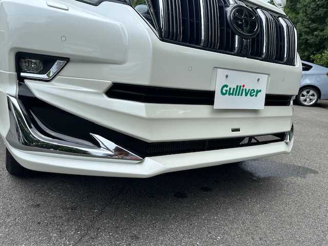 トヨタ ランドクルーザー プラド TX Lパッケージ 大阪府 2020(令2)年 3.8万km ホワイトパールクリスタルシャイン モデリスタエアロ　F/R/純正9型ナビ(NSZT-Y68T)/バック/フロントモニター/フルセグ/Bluetooth/トヨタセーフティセンス/ルーフレール/GANADORマフラー/バックミラーモニター/ブラックレザーシート/パワーシート/シートヒーター/シートベンチレーション/LEDヘッドライト/純正アルミホイール/ビルトインETC/スマートキー