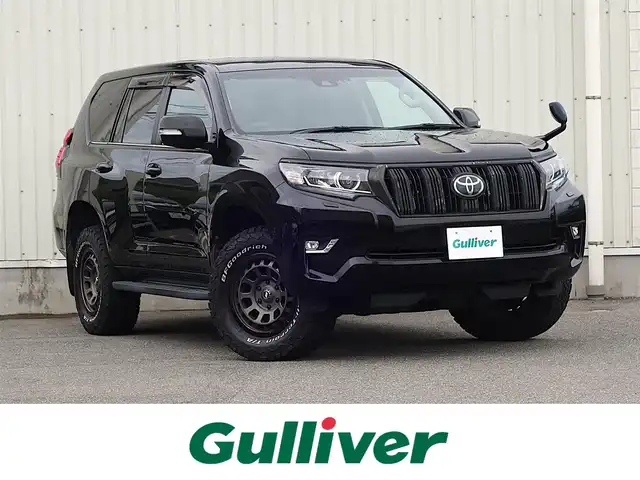 トヨタ ランドクルーザー プラド TX Lパッケージ 山形県 2018(平30)年 9.9万km ブラック 4WD/衝突被害軽減システム/純正SDナビ/　　【CD DVD BT フルセグ USB MSV】/バックカメラ/レーダークルーズコントロール/LEDオートライト/レザーシート/パワーシート/シートエアコン/シートヒーター/17インチアルミホイール/ドライブレコーダー/コーナーセンサー/ステアリングスイッチ/MTモード付AT/純正フロアマット/スマートキー/ETC2.0